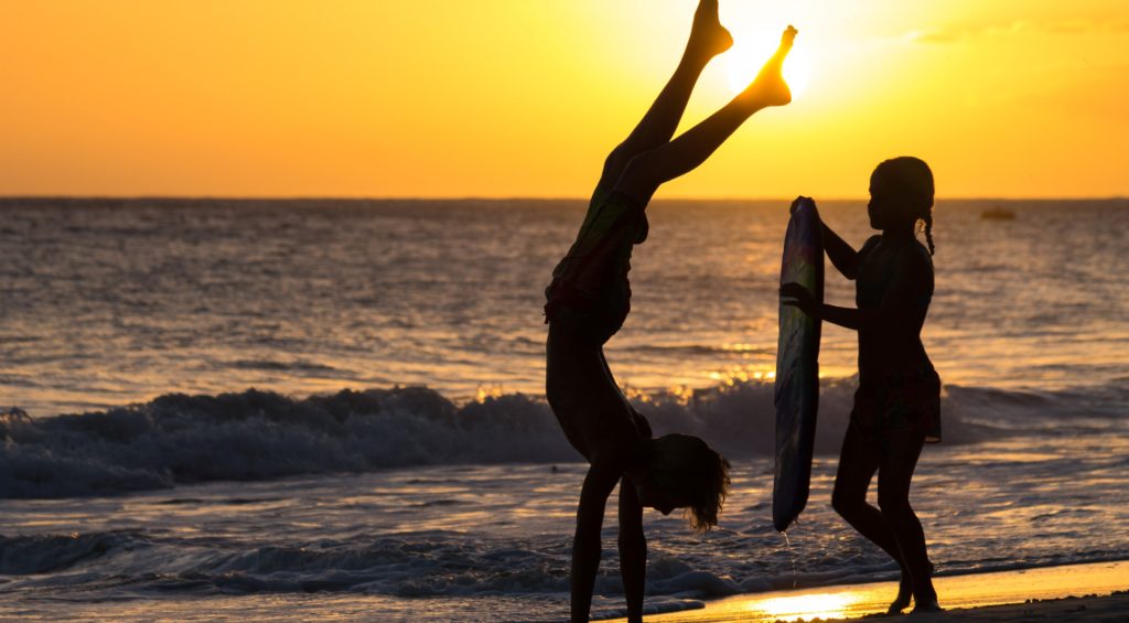 children playing at a beach